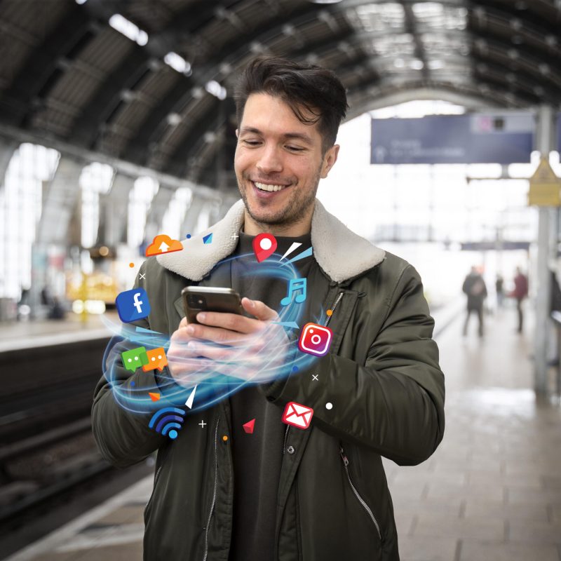 medium-shot-man-holding-smartphone