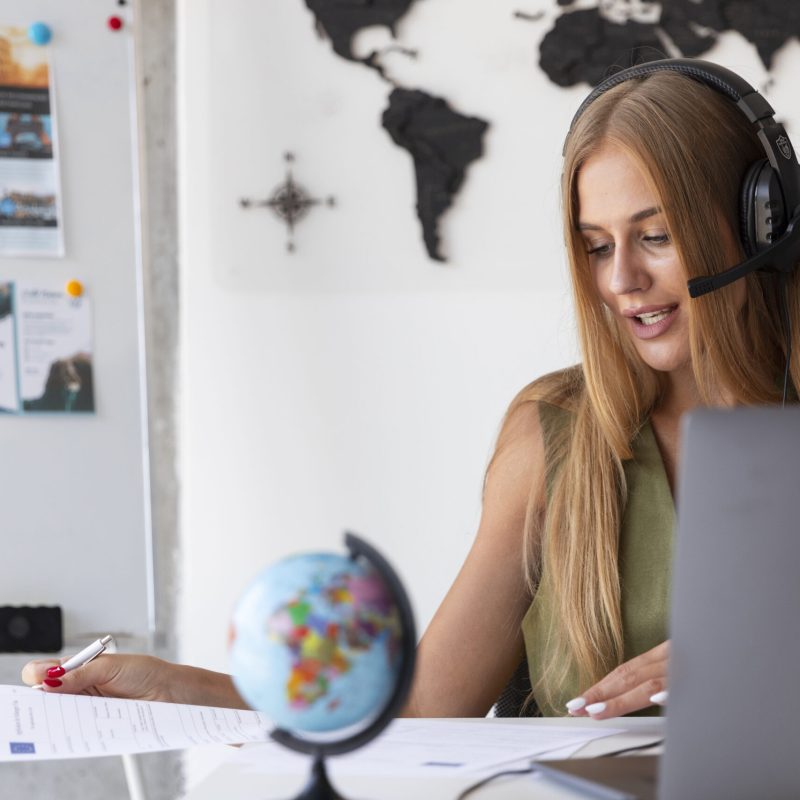 medium-shot-woman-working-travel-agency